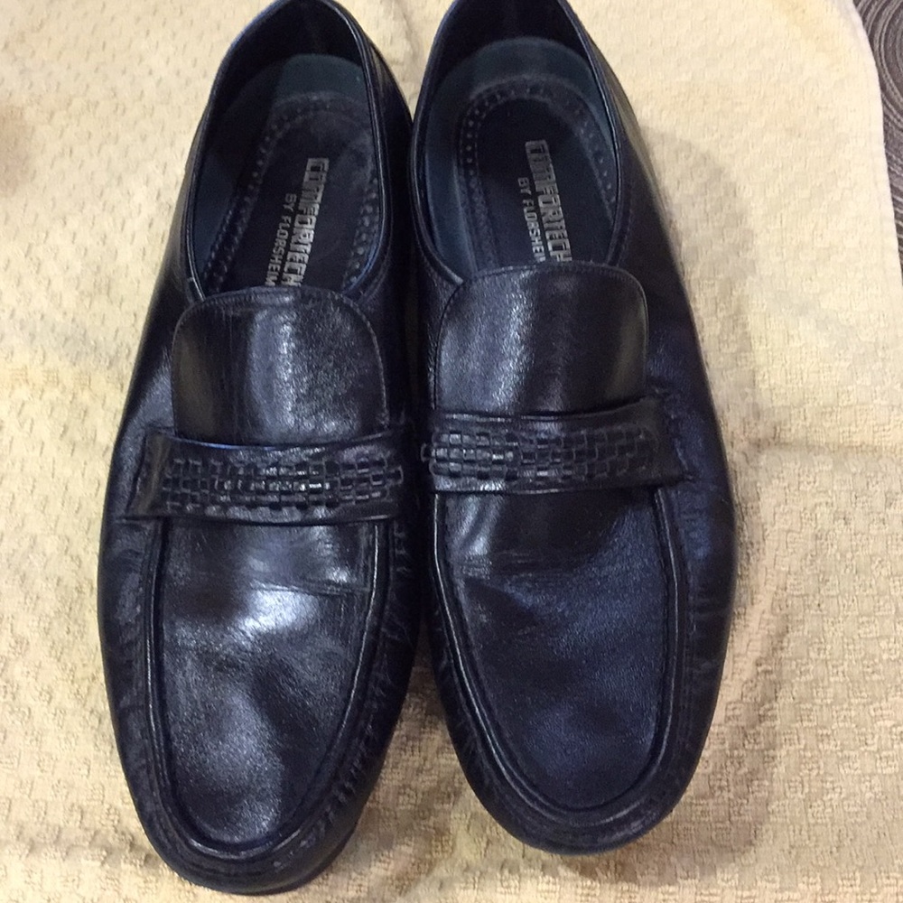 Men’s Florsheim black dress shoes.